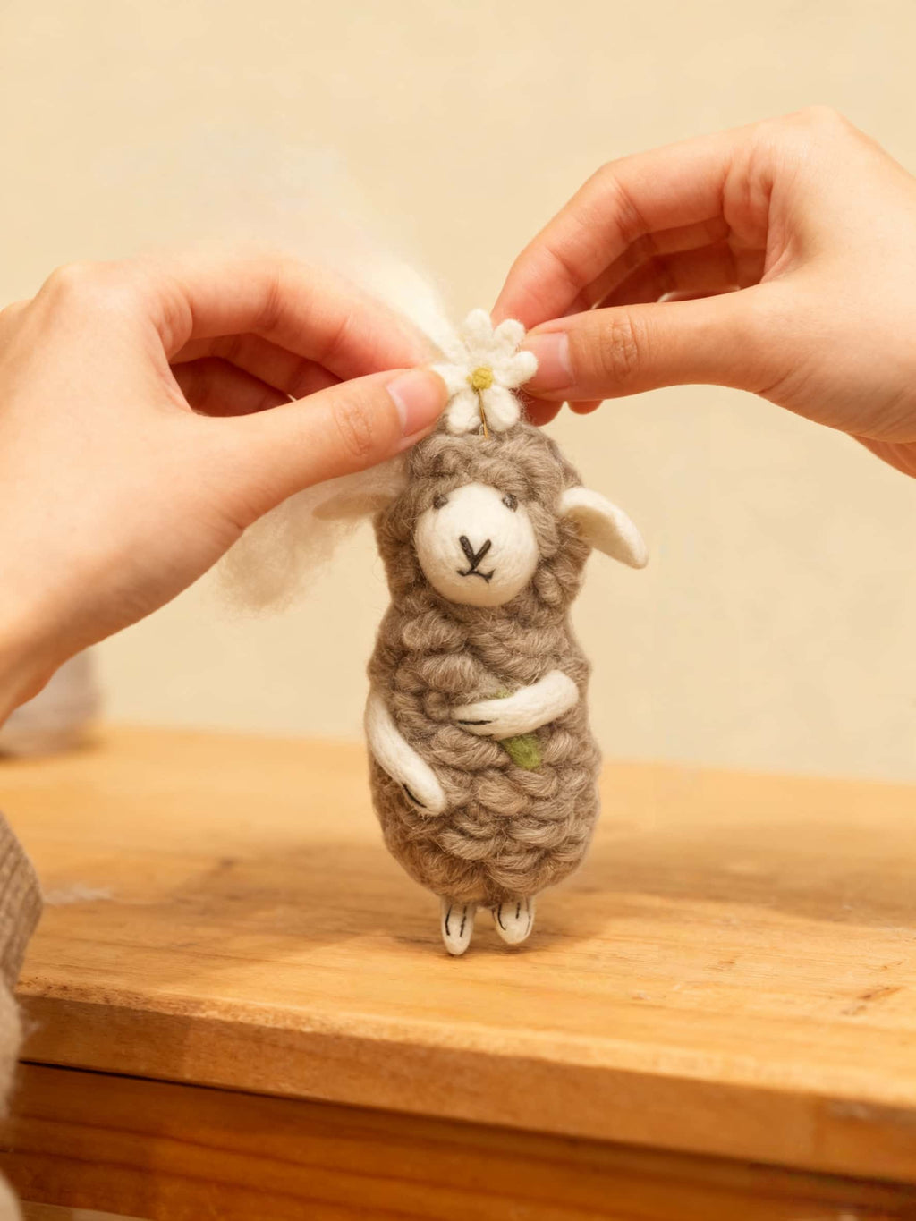 Artisanal Wool Felt Sheep Hugging Daisy Charm