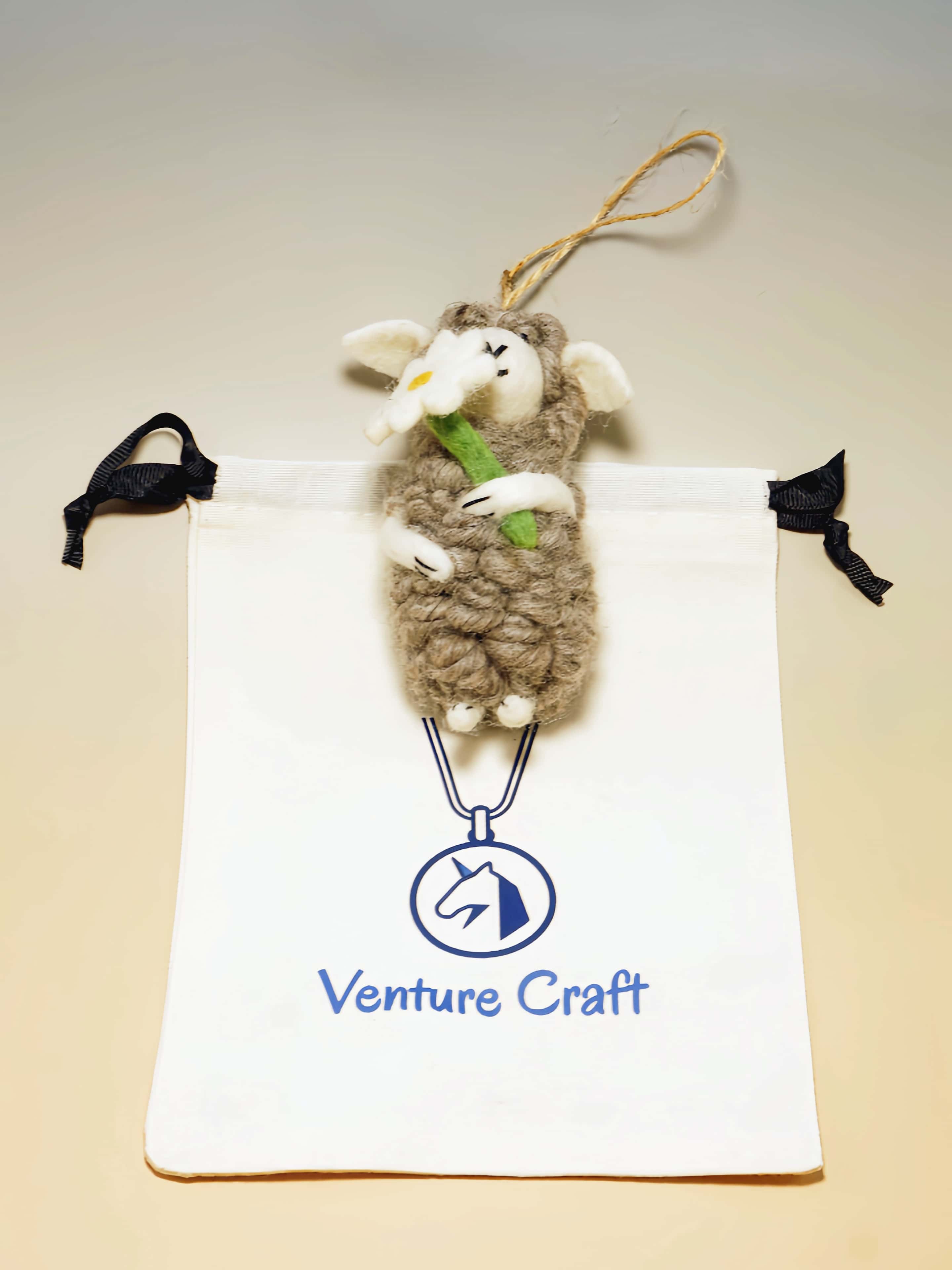 Artisanal Wool Felt Sheep Hugging Daisy Charm