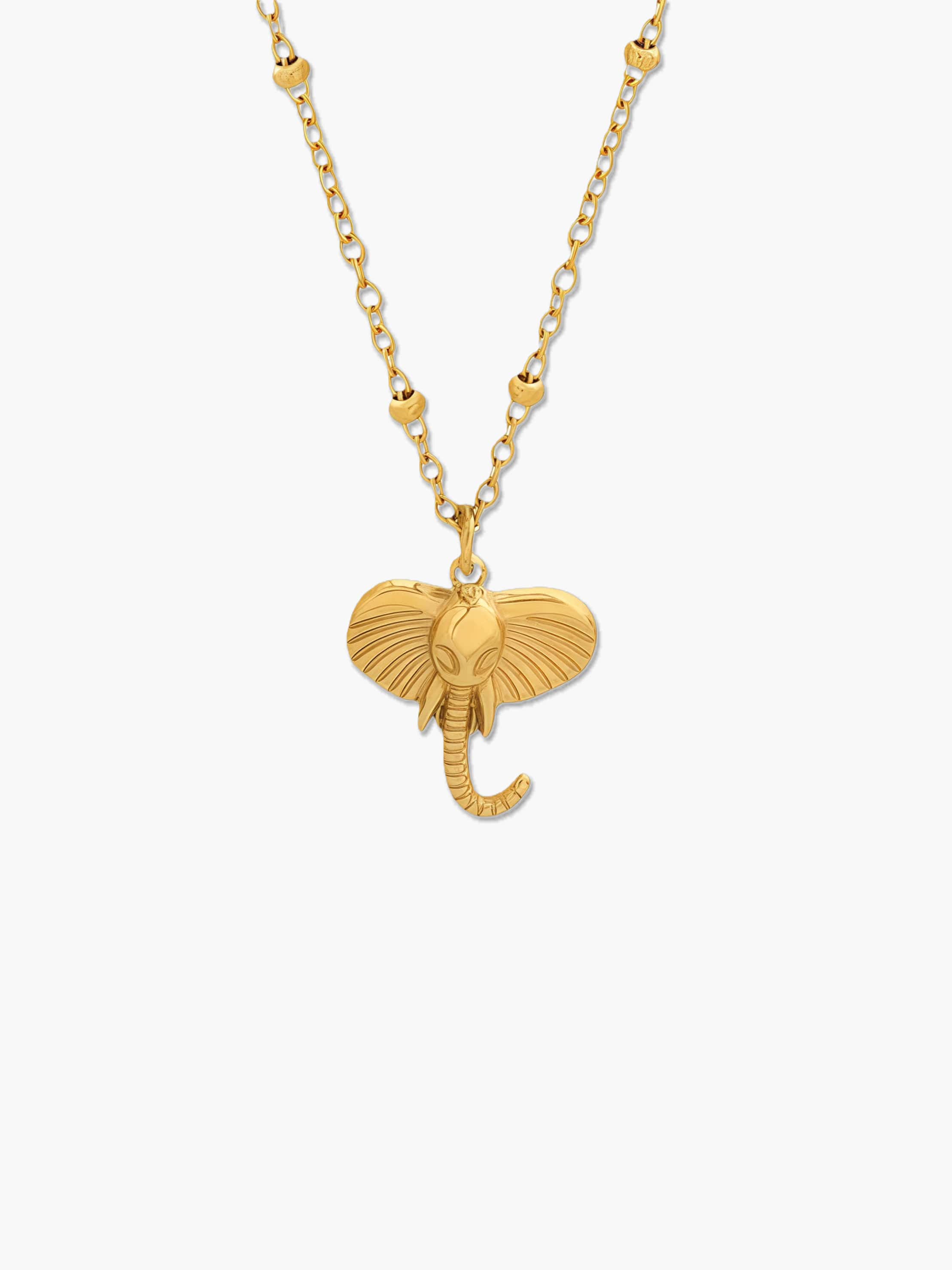 gold elephant pendant necklace on a white background